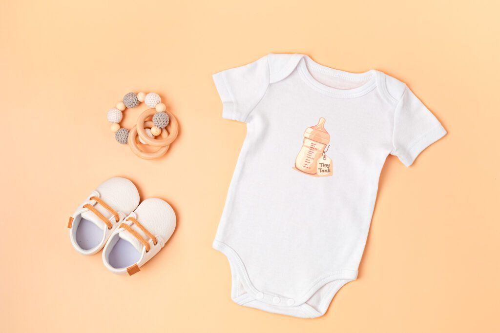 Newborn baby bodysuit in soft cotton with milk design on neutral background